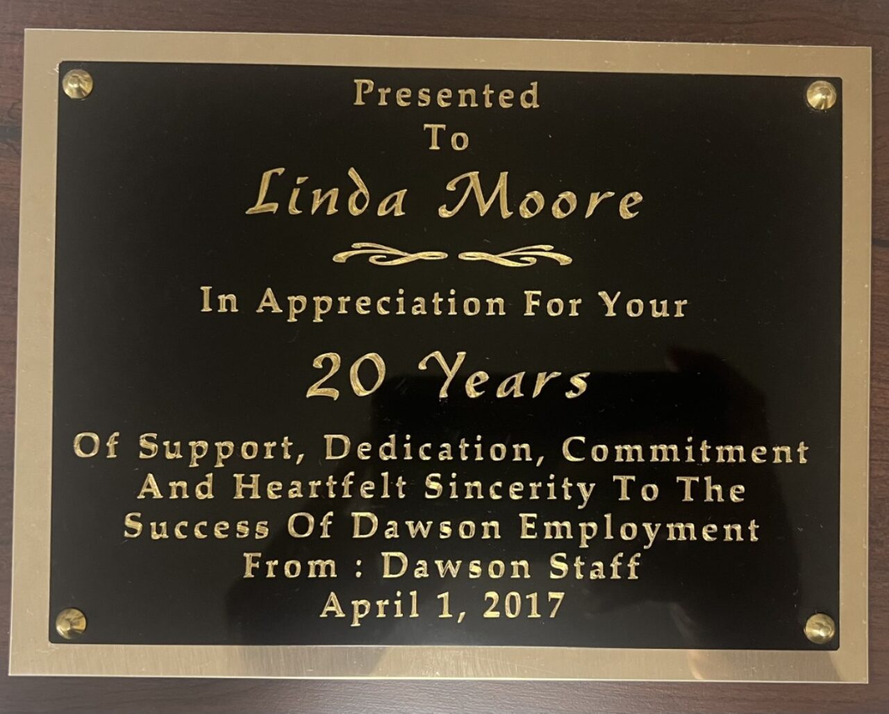 An Award to Linda Moore on April One